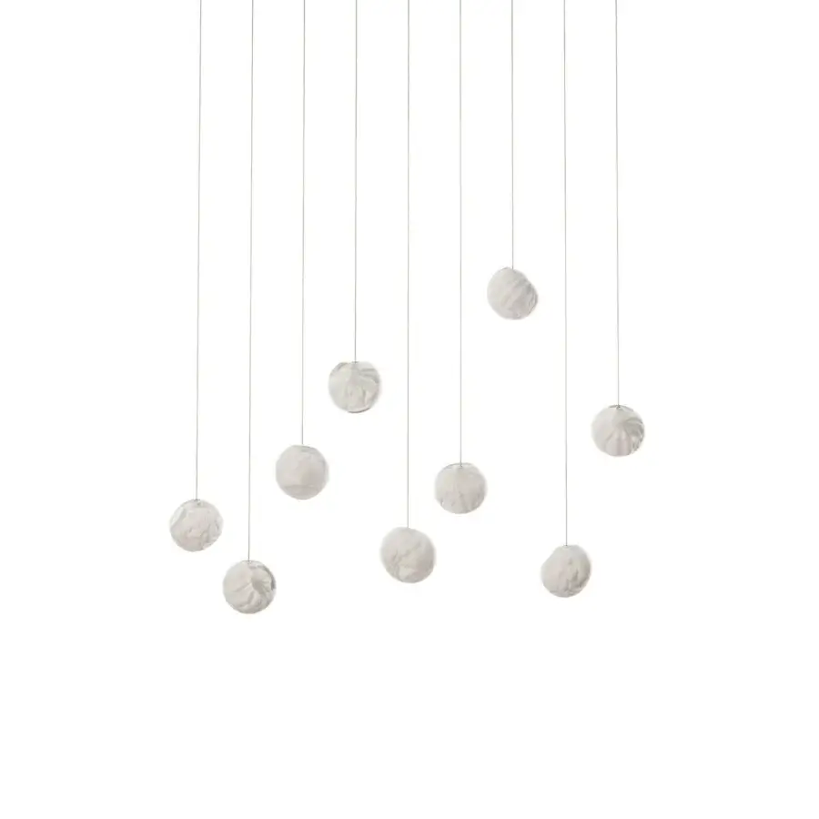 Distinguished Bocci 118 Linear Suspension Lamp with nine hand-blown glass pendants and matte textured form in pale off-white tone