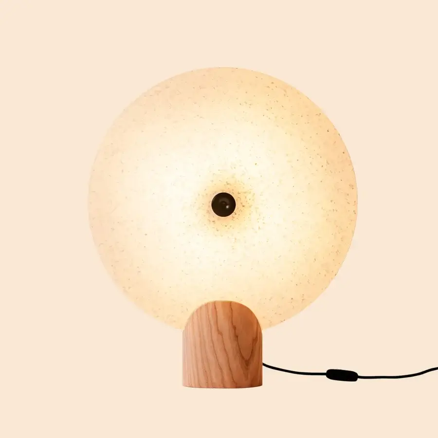 Exceptional Miniforms Rificolona table lamp with a translucent speckled polyethylene shade and Black Ash wood base