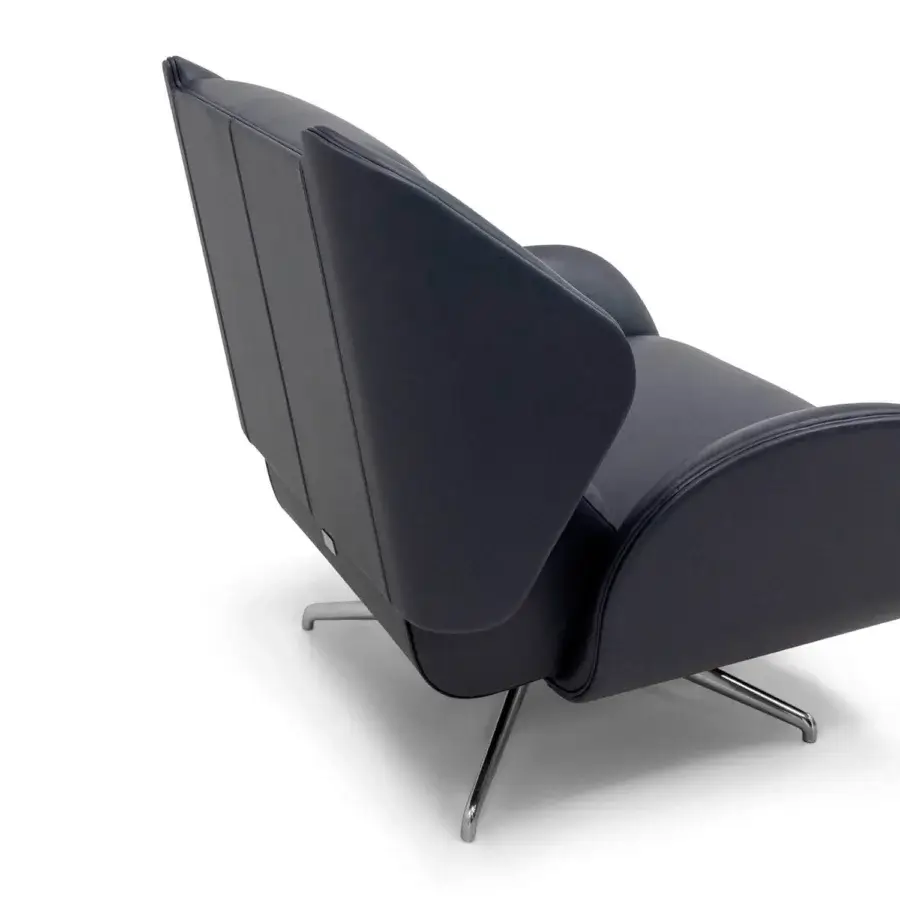 Distinguished WAYNE Enterprises WE-015 lounge chair with deep navy blue leather upholstery and polished metal base crafted in Italy