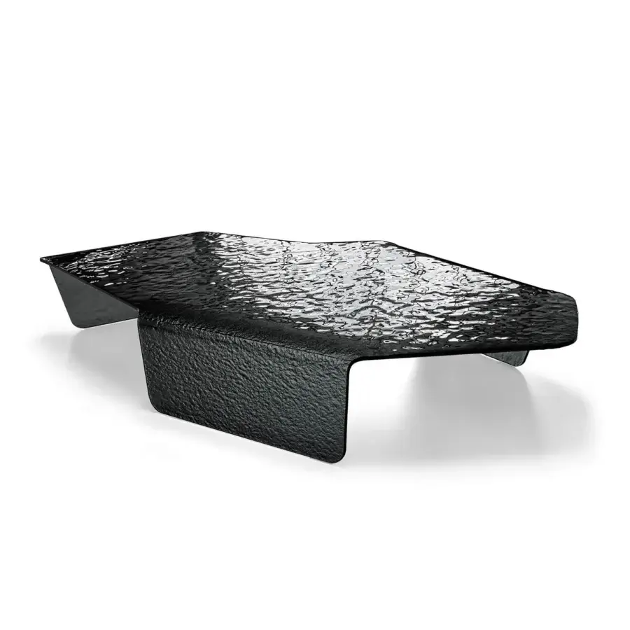Superior Arketipo Chimera coffee table built with curved, hammered glass and a textured base in a modern aesthetic