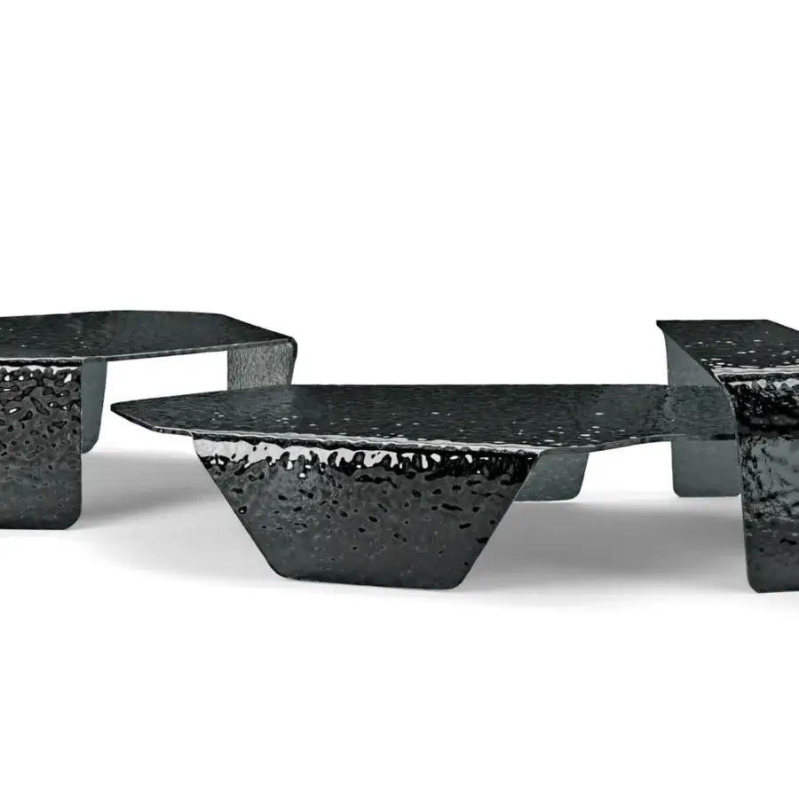 Superior Arketipo Chimera coffee table crafted with curved, hammered black glass exhibiting a textured, bubbly finish