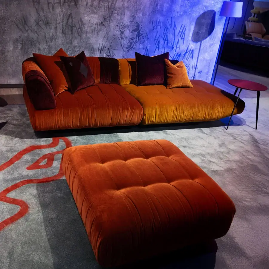 Superior Chaos Modular sofa from The Joker Home Collection crafted in plush textured velvet with a warm orange hue
