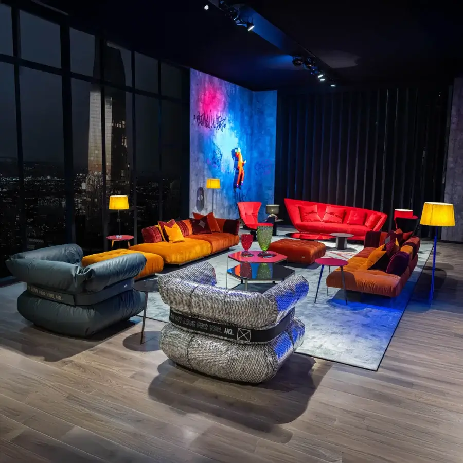 Distinctive Chaos Modular sofa from The Joker Home Collection built in textured grey textile with vibrant mustard yellow and red accents