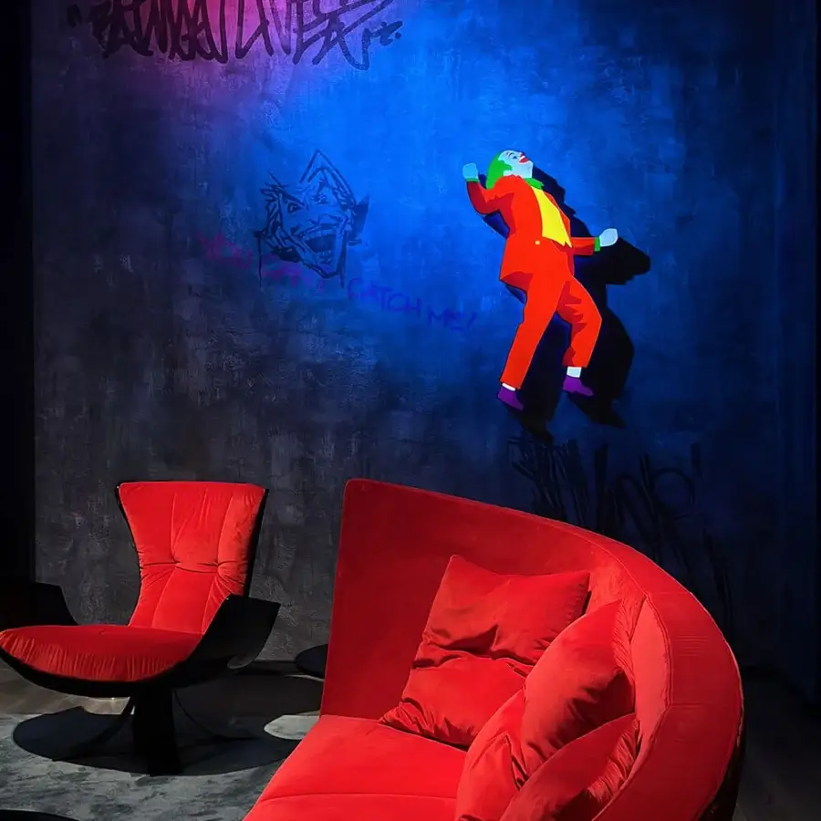 Exceptional Joker Home Throne lounge chair with hand-sculpted fiberglass shell enveloped in rich red velvet with unpredictable textures