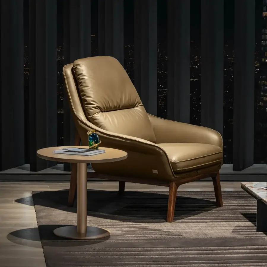 Distinguished WAYNE Enterprises WE-053 lounge chair upholstered in golden-brown leather with a satin-finished wood frame