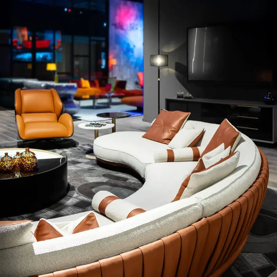 Exceptional Wayne Enterprises WE-036 modular sofa upholstered in textured off-white fabric with a lacquered base and tan leather exterior