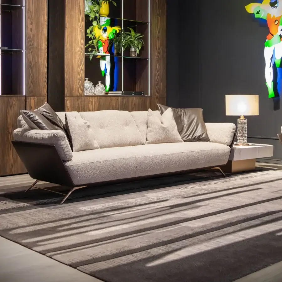 Sophisticated WAYNE Enterprises WE-001 sofa with neutral beige textile upholstery and sleek metal base built with a matte finish