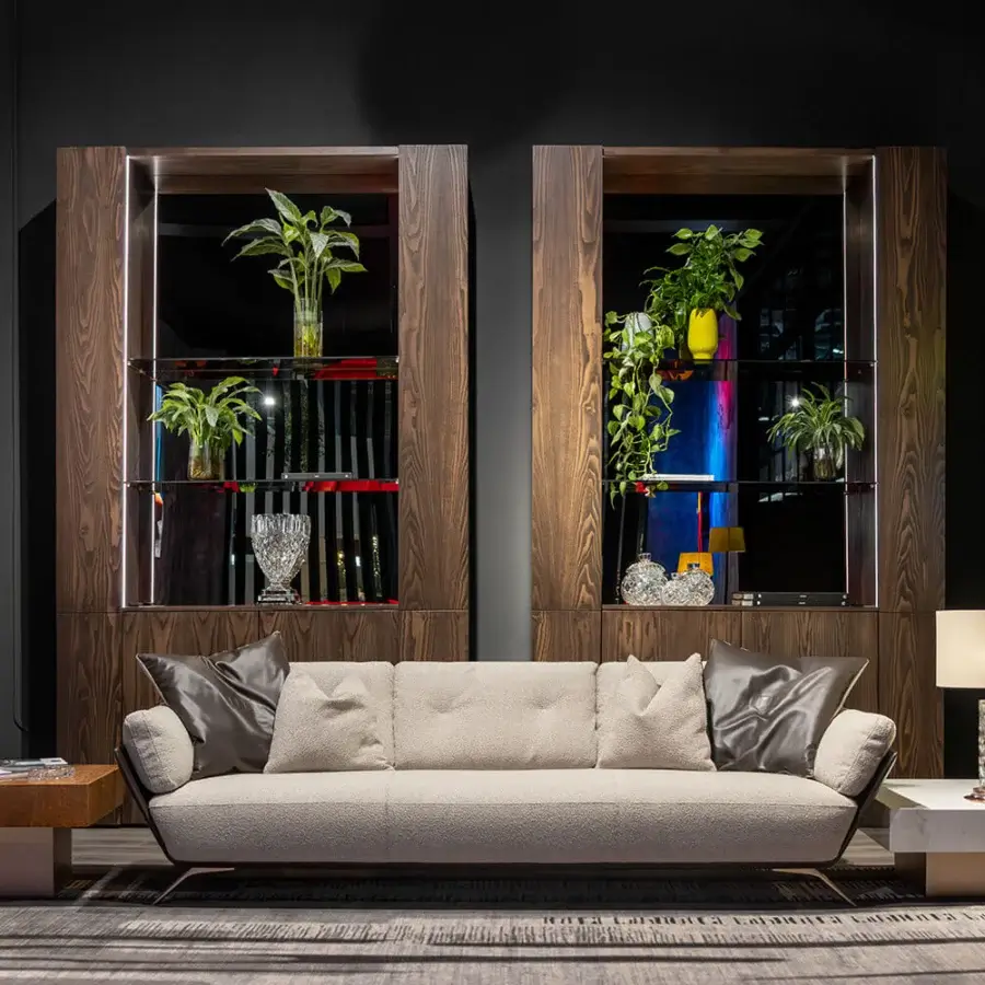 Exclusive WAYNE Enterprises WE-001 sofa with neutral beige fabric upholstery, darker gray cushions and sleek metal feet crafted in Italy