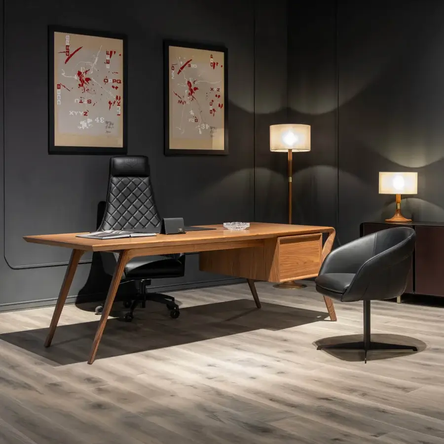 Distinguished WAYNE Enterprises WE-026 desk with medium-brown wood veneer, darker wood legs and premium leather drawer fronts in satin finish