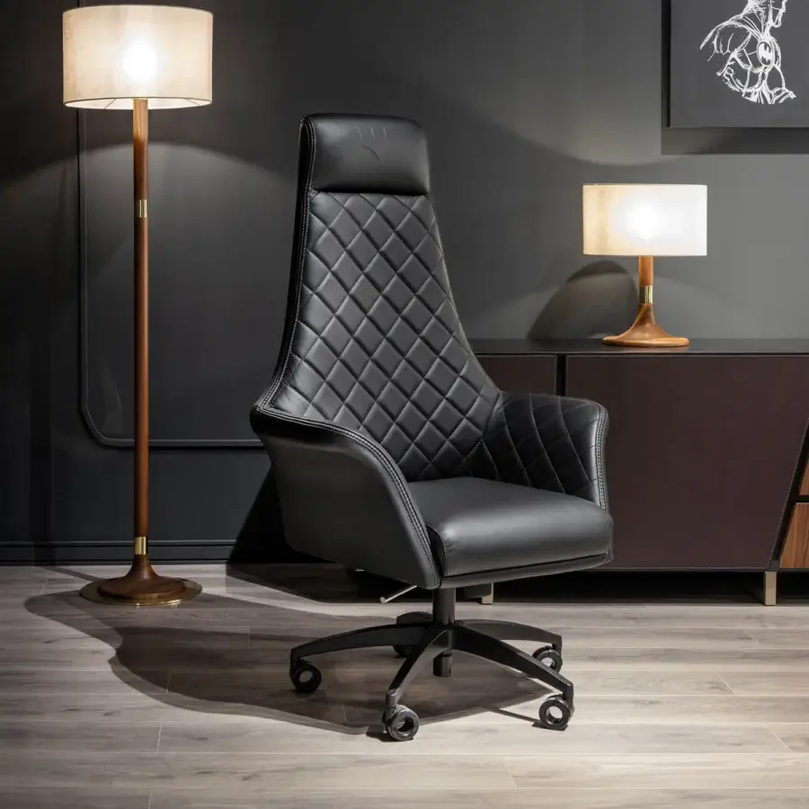 Distinguished Wayne Enterprises WE-173 office chair in premium leather with matellassé stitching and glossy dark metal swivel base