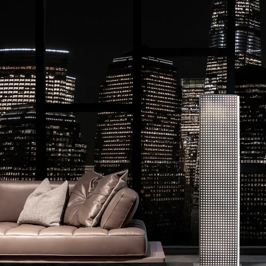 Distinguished WAYNE Enterprises WE-122 floor lamp with neutral gray metal frame and geometric perforations crafted in Italy