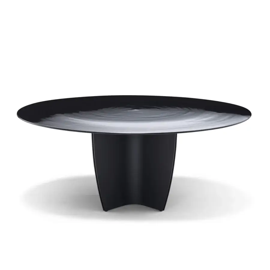 Innovative Arketipo Gambler table with a rippled reflective surface and matte black sculpted base crafted in Italy