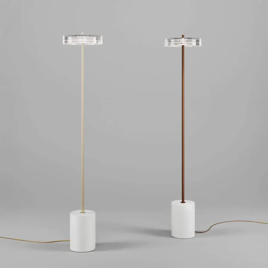Superior Italamp Gilda floor lamp with a slender metal structure and gold-toned transparent glass diffuser cage crafted in Italy
