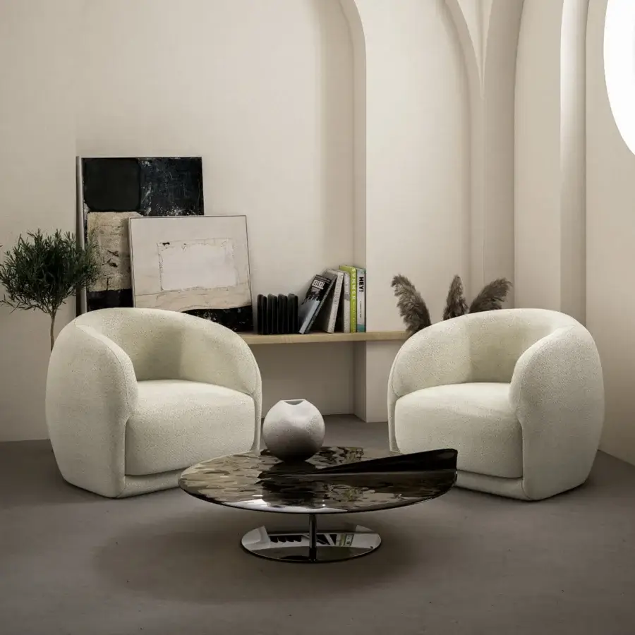 Superior Arketipo Maverick coffee table with circular glass tabletop and polished silver-toned metal pedestal base crafted in Italy