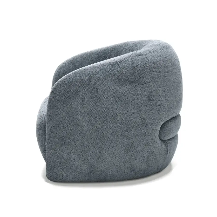 Distinguished Arketipo Touch Me lounge chair in muted gray-blue textile with a matte finish, showcasing fluid curves and sculptural form