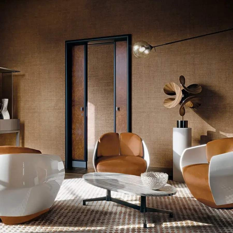 Distinguished Giorgetti Lorelei lounge chair with lacquered white shells and reddish-brown leather inserts crafted in Italy with satin-sheen wood detail