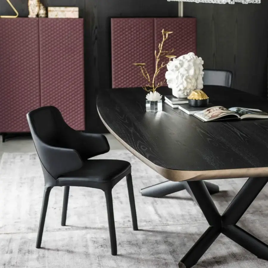 Superior Cattelan Italia Wanda armchair with sleek black soft leather and smooth curved lines