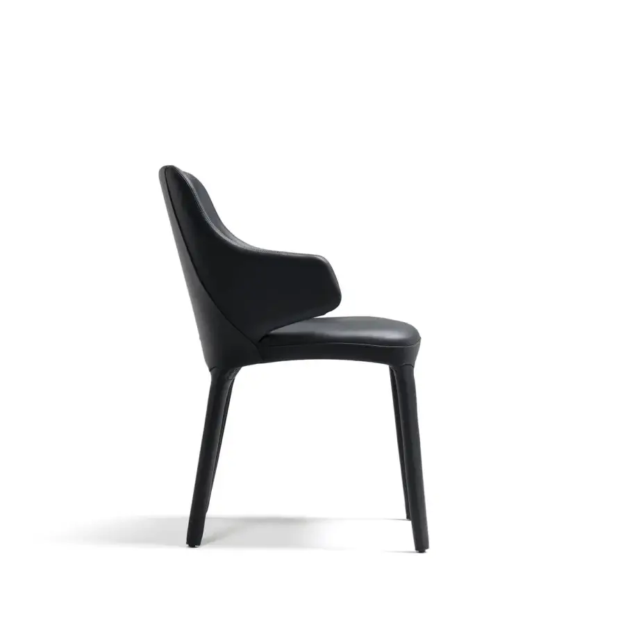 Exclusive Cattelan Italia Wanda armchair with sleek black synthetic leather and curved steel frame