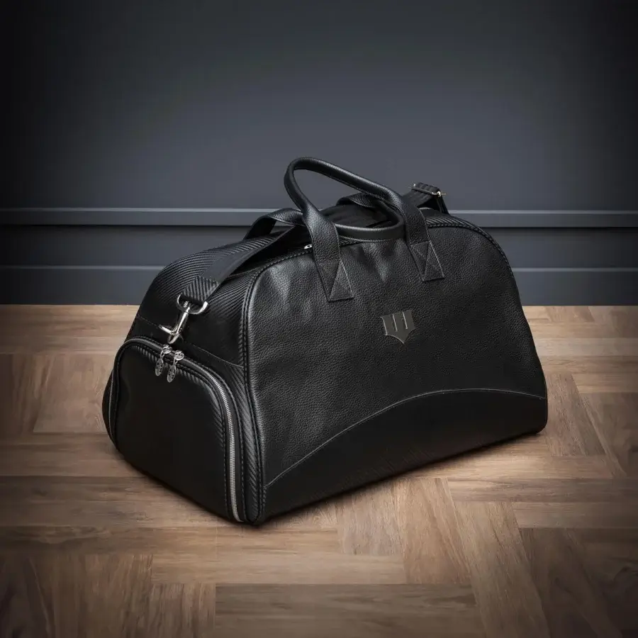 Superior WAYNE Enterprises WE-TRAVEL 438 travel bag crafted in black leather and carbon fiber textured leather with matte finish