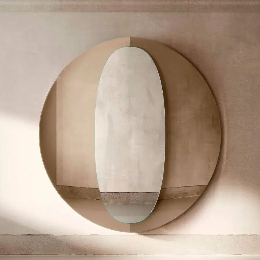 Distinguished Tonelli Design Central mirror with warm beige textured base and delicate teal accents in reflective glass