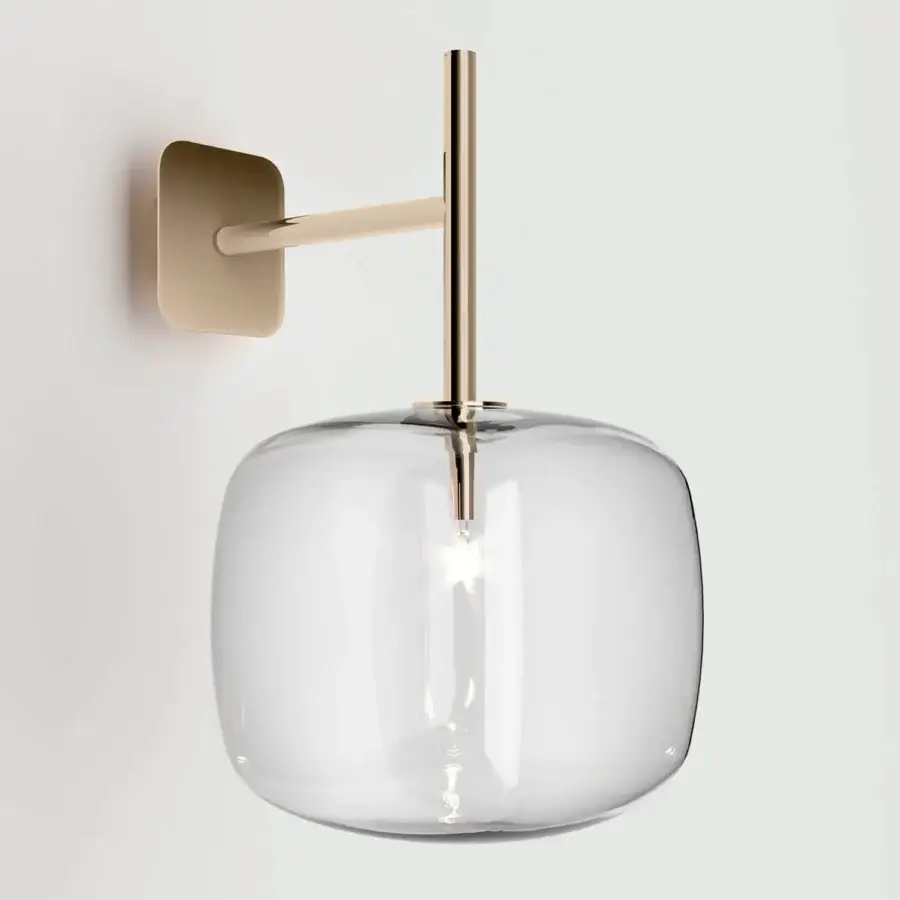 Captivating Tonelli Design Hyperion wall lamp crafted in transparent blown pyrex glass with a polished gold metal arm