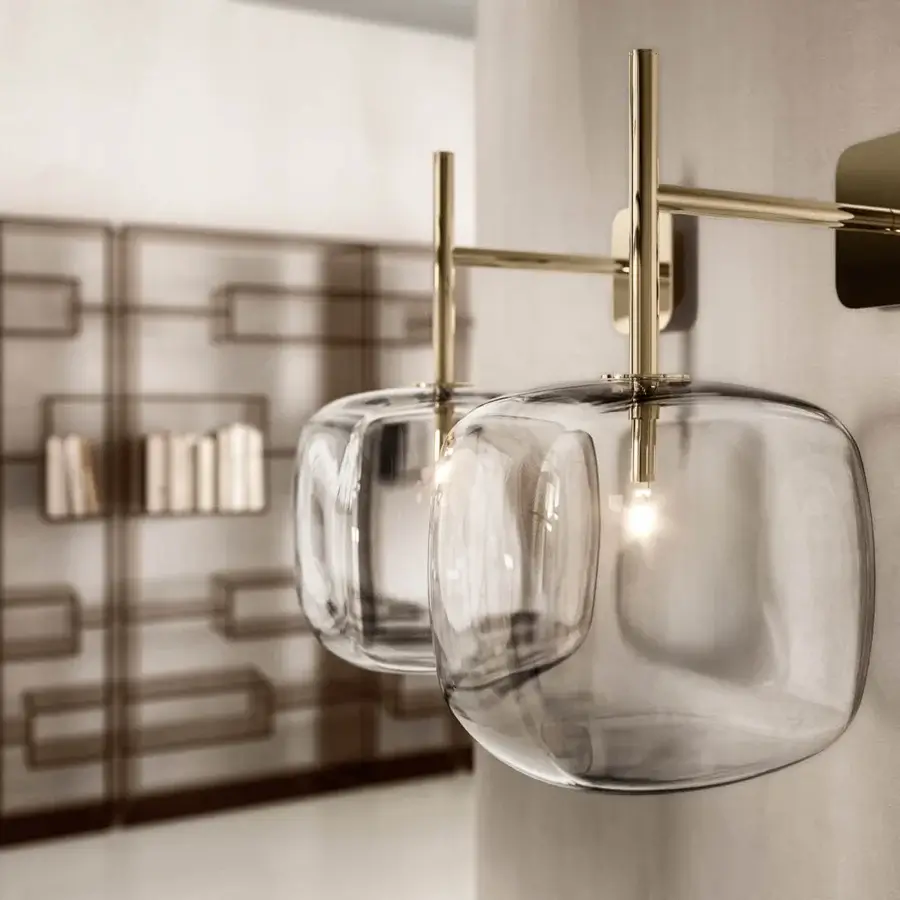 Superior Tonelli Design Hyperion wall lamp crafted in transparent blown pyrex glass with polished gold finish