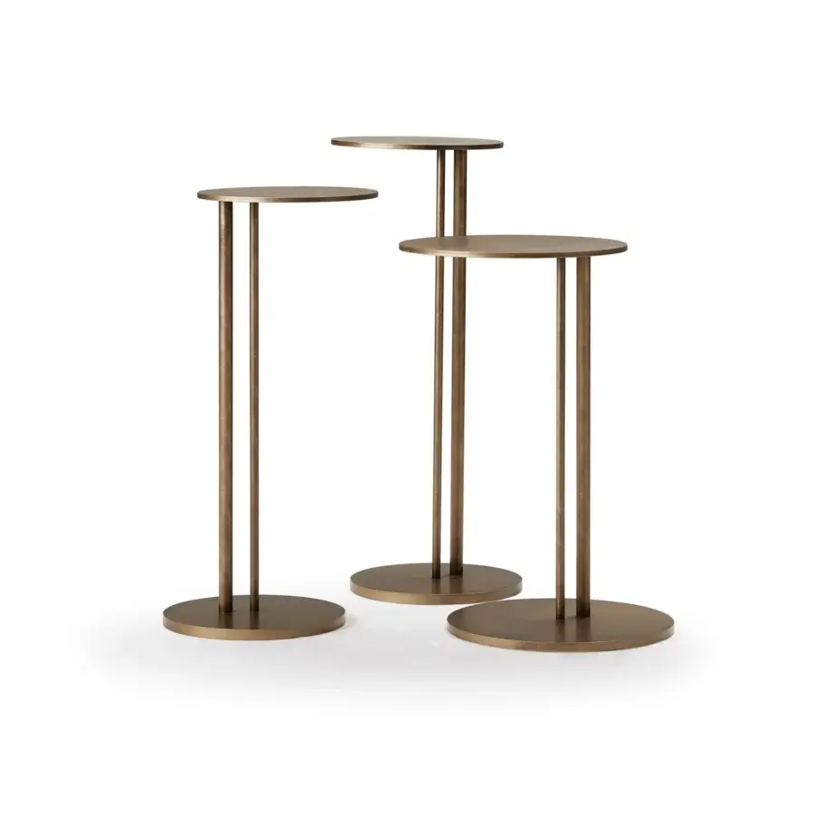 Elegant Cattelan Italia Sting side table with a round tabletop in brushed bronze steel and matte finish