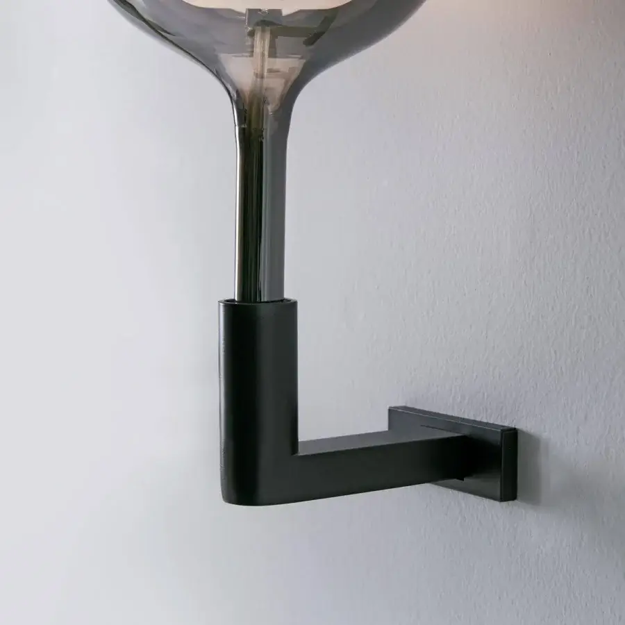 Superior Penta Glo wall lamp with refined mirrored glass and gradient smoky gray blown glass shade in matte black metal