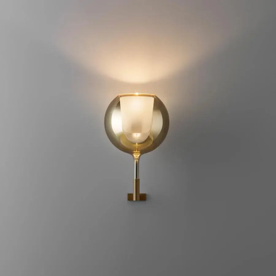 Lavish Penta Glo wall lamp with gold metal structure and mirrored glass outer shade, crafted in sandblasted cylindrical form