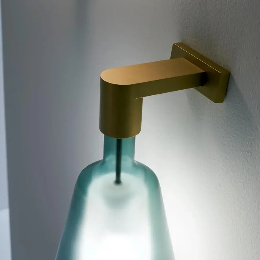 Superior Penta MoM wall lamp with light turquoise borosilicate glass shade and matte brass metal support arm