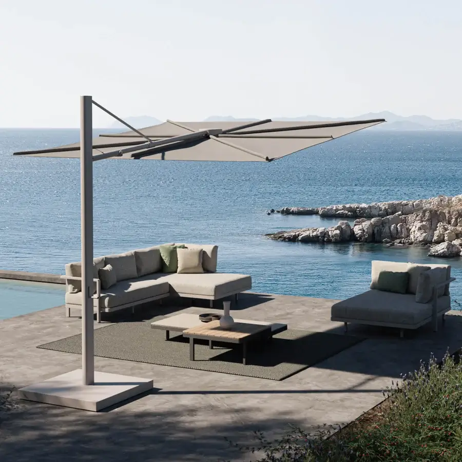 Elegant Royal Botania Solaz umbrella with a light-colored metal frame and neutral beige textile canopy