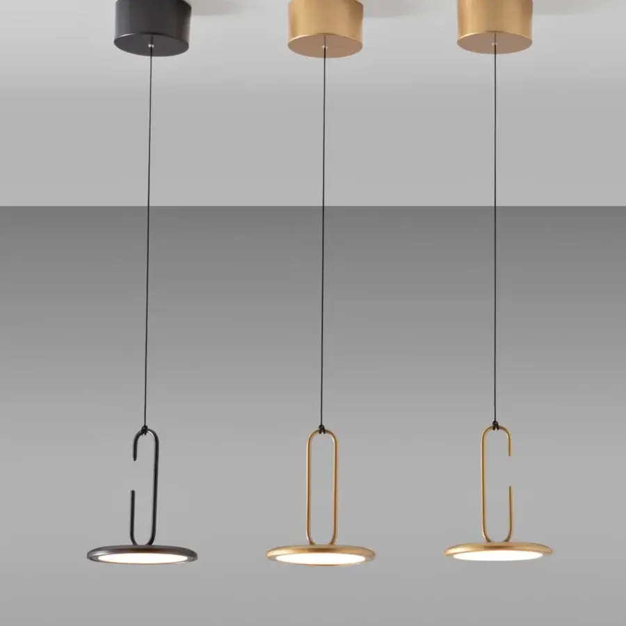 Distinguished Penta Clip suspension lamp with refined metal structure in a high-quality matt gold finish exemplifying contemporary style