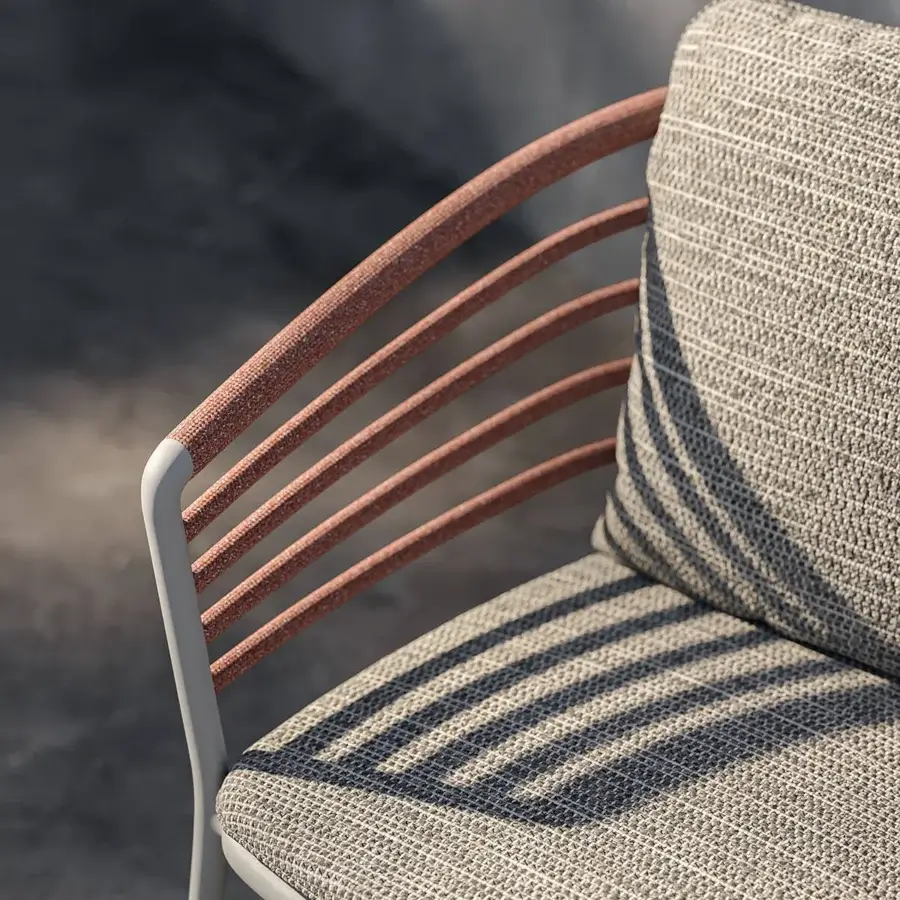Distinguished Royal Botania Archy armchair with a satin metal frame and neutral gray Batyline seat built with reddish-brown wrappings