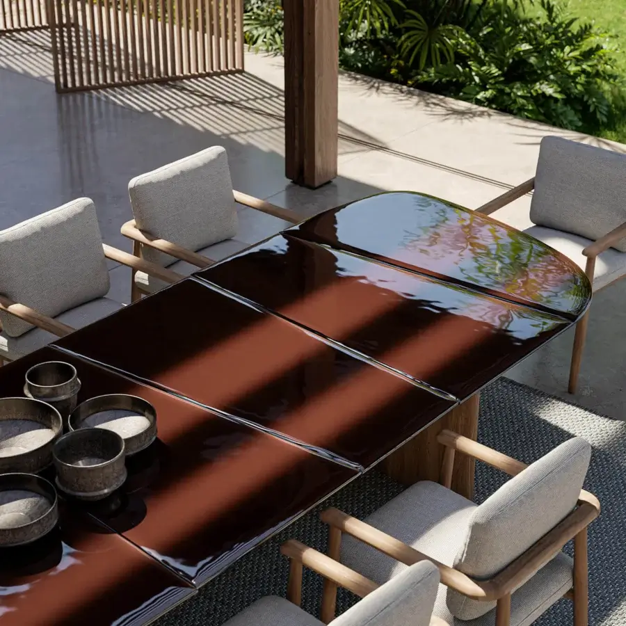 Exceptional Royal Botania Regaliz table with reddish-brown glass tabletop crafted using a unique melting technique and lighter-toned teak base