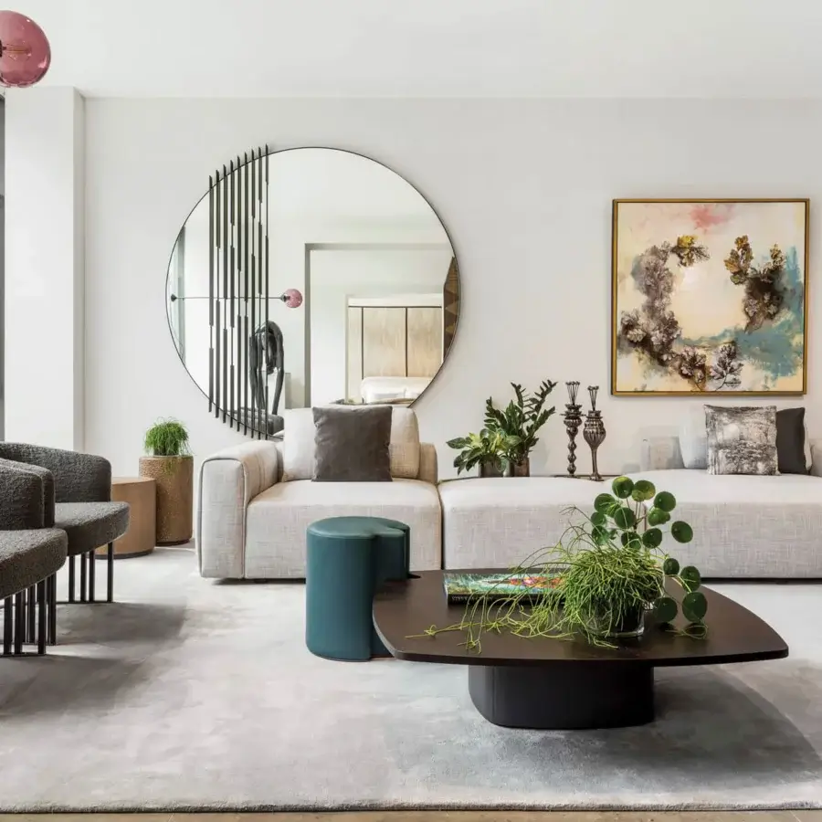 Elegant Giorgetti Hero lounge chair upholstered in muted gray fabric or two-tone leather with a canaletto walnut base