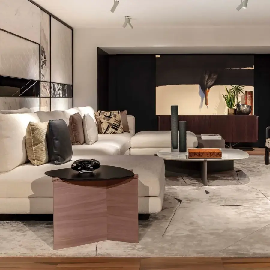 Distinguished Giorgetti Griffe coffee table with asymmetrical Canaletto walnut and striking pau ferro details in warm reddish-brown tones