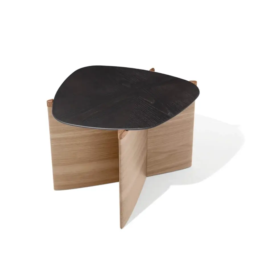 Exceptional Giorgetti Griffe coffee table with an asymmetrical Canaletto walnut base and uniquely shaped dark-toned tabletop crafted in wood with pau ferro accents