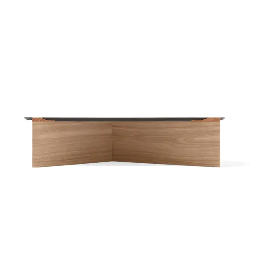 Distinguished Giorgetti Griffe coffee table with a striking asymmetrical Canaletto walnut base and uniquely shaped top in dark inlay with a satin finish