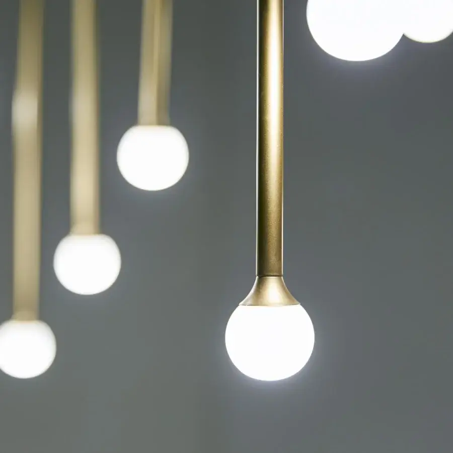 Superior Penta Storm suspension lamp with illuminated spherical diffusers and brushed gold varnished metal stem