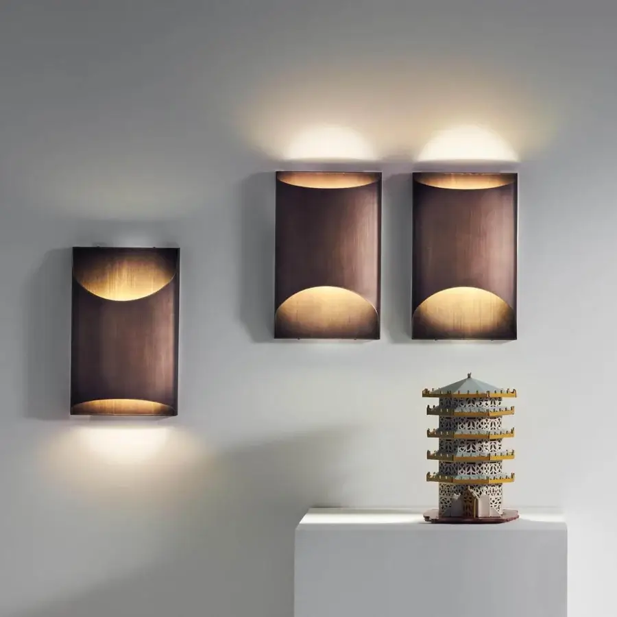 Distinguished Penta Aprile wall lamp with clean geometric lines in brushed bronze metal offering a minimalist rectangular form