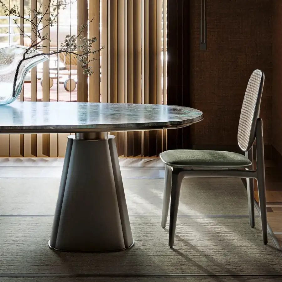 Elegant Giorgetti Floria table with elongated glass tabletop and subtly textured grey metal base
