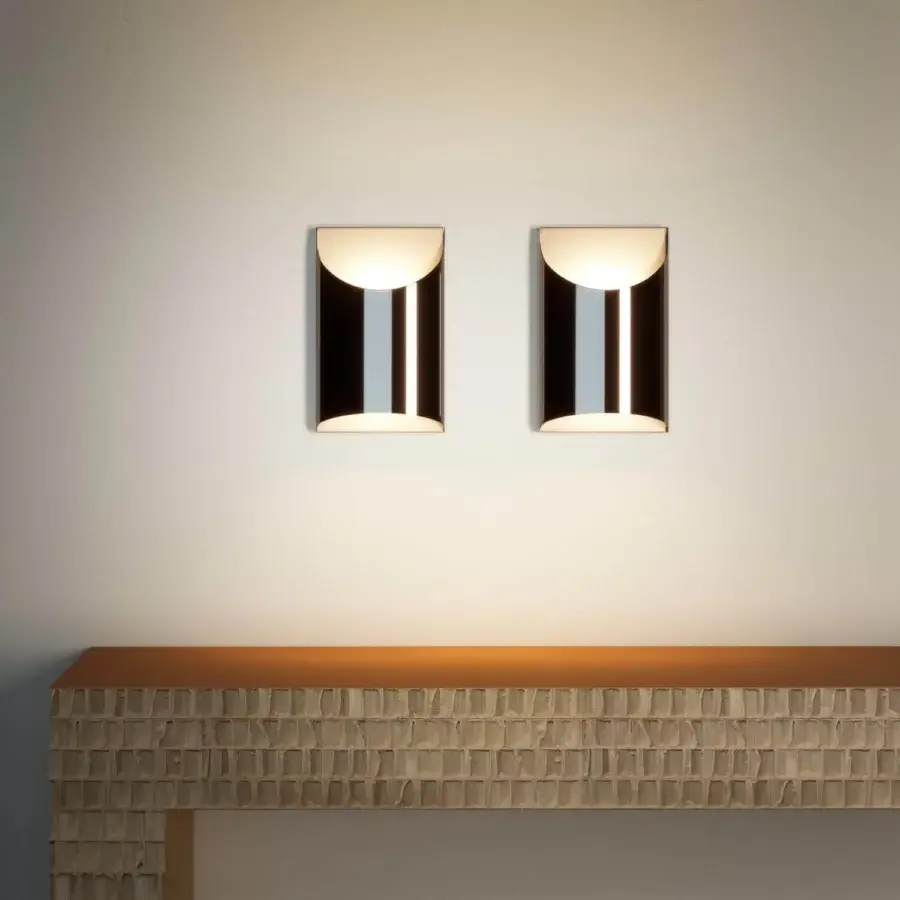 Distinguished Penta Aprile wall lamp with sleek metal structure and bright focused light in brushed bronze finish