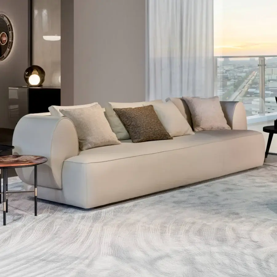 Distinguished Sicis Botero sofa with light beige woven fabric and organically curved silhouette crafted with timber and plywood frame