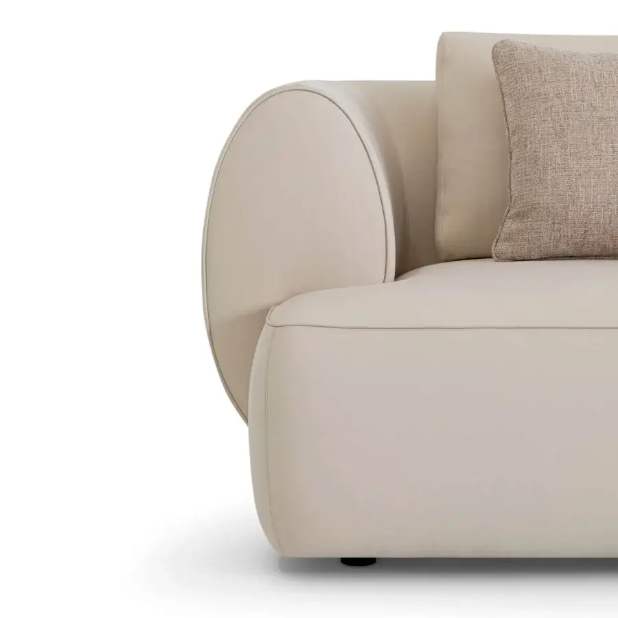 Distinguished Sicis Botero sofa with a rounded form upholstered in light beige smooth matte-finish leather and solid timber frame