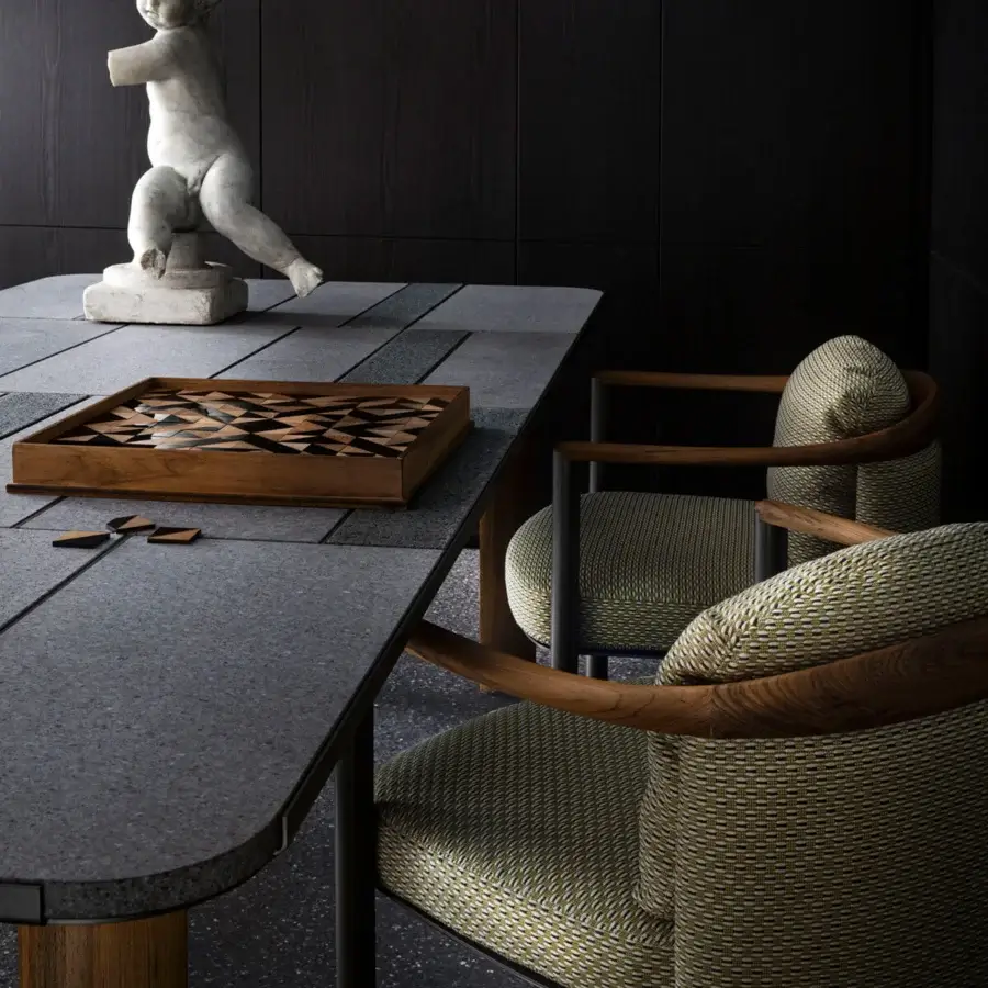 Captivating Giorgetti Moorea table with Etna lava stone, teal glass powder, teak wood legs and pewter painted stainless steel frame