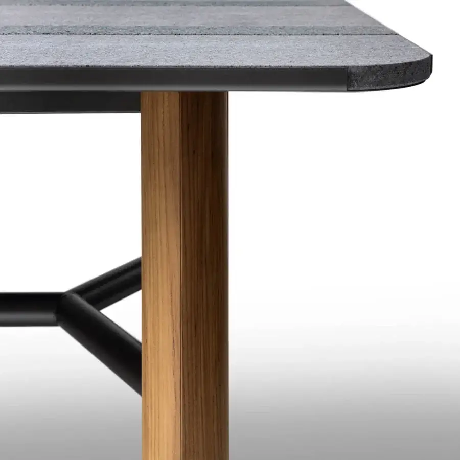 Distinguished Giorgetti Moorea table with dark gray Etna lava stone and teak wood, built with a satin finish and pewter painted stainless steel base