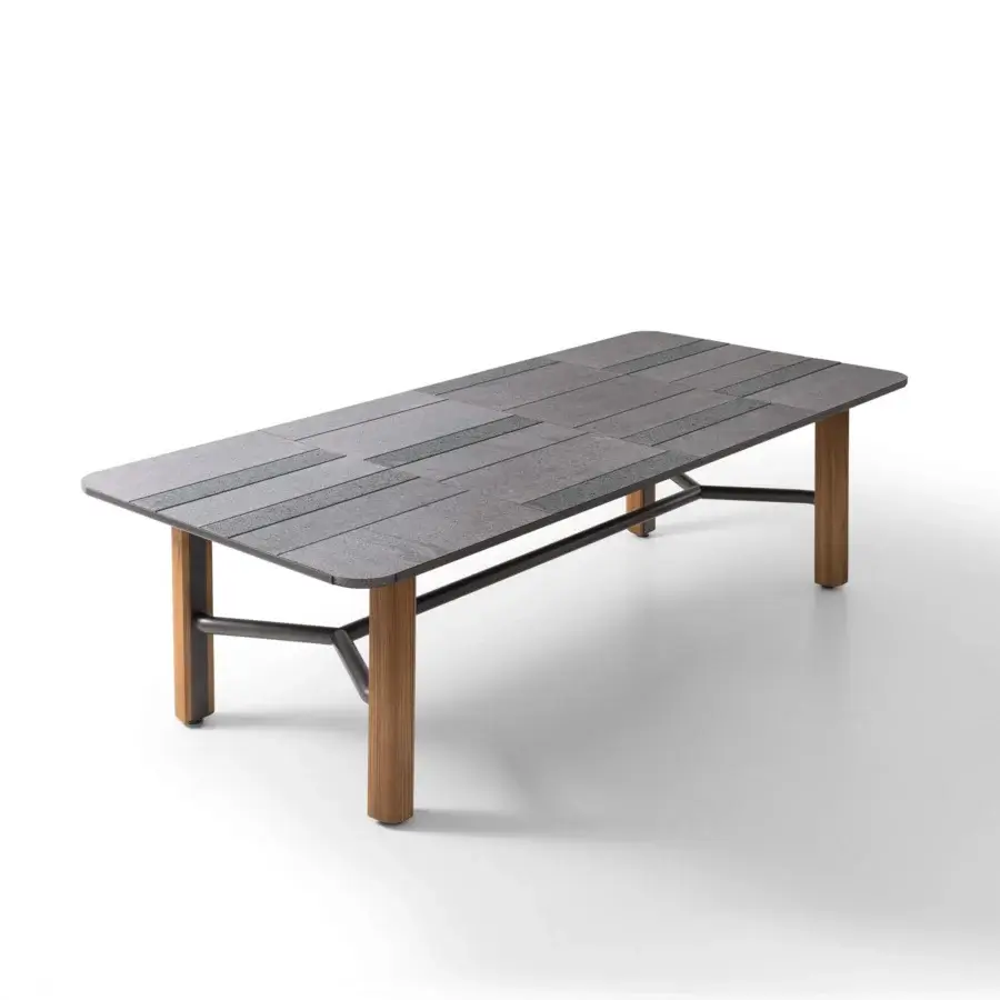 Elegant Giorgetti Moorea table with dark gray Etna lava stone, pearl glass powder, pewter stainless steel, and satin teak wood legs