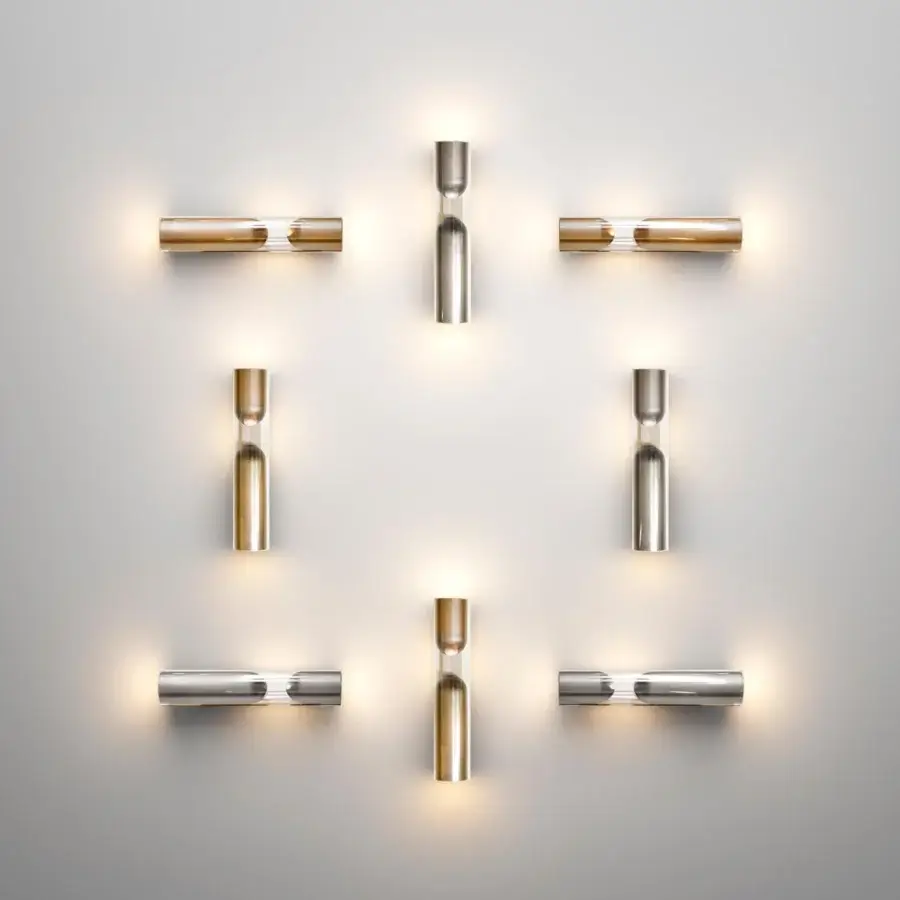 Exceptional Penta Clash wall lamp uniting glass transparency with brushed bronze crafted in a minimalist cylindrical composition