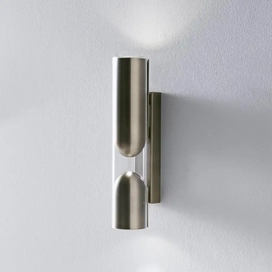 Sophisticated Penta Clash wall lamp uniting transparent glass with brushed bronze crafted for ambient illumination