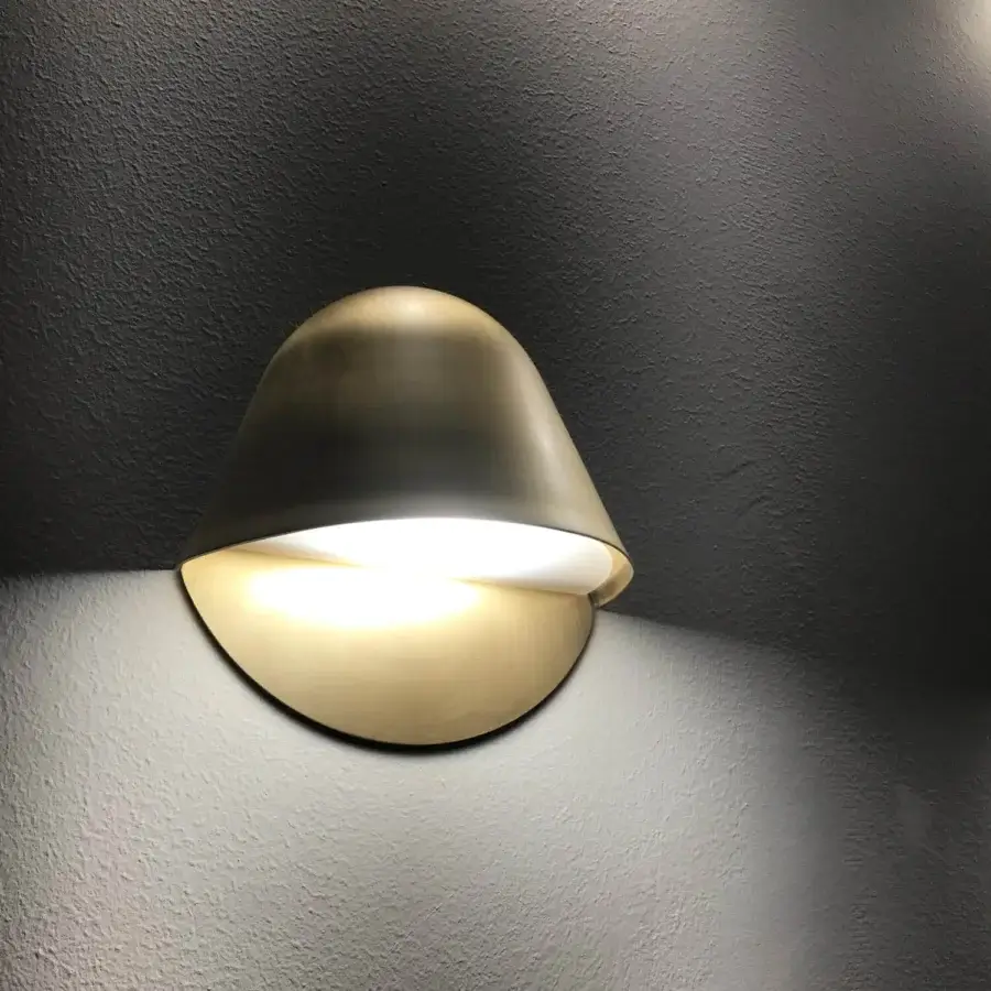 Distinguished Penta Enoki wall lamp crafted in Italy with muted gold varnished metal and rounded dome silhouette